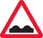 bumpy road traffic sign
